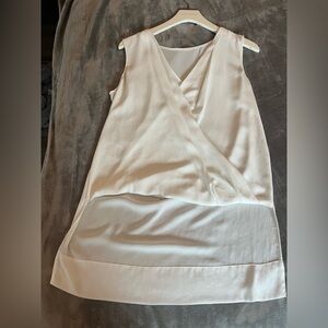 Elegant Cream Sleeveless Blouse - Sheer & High Low
